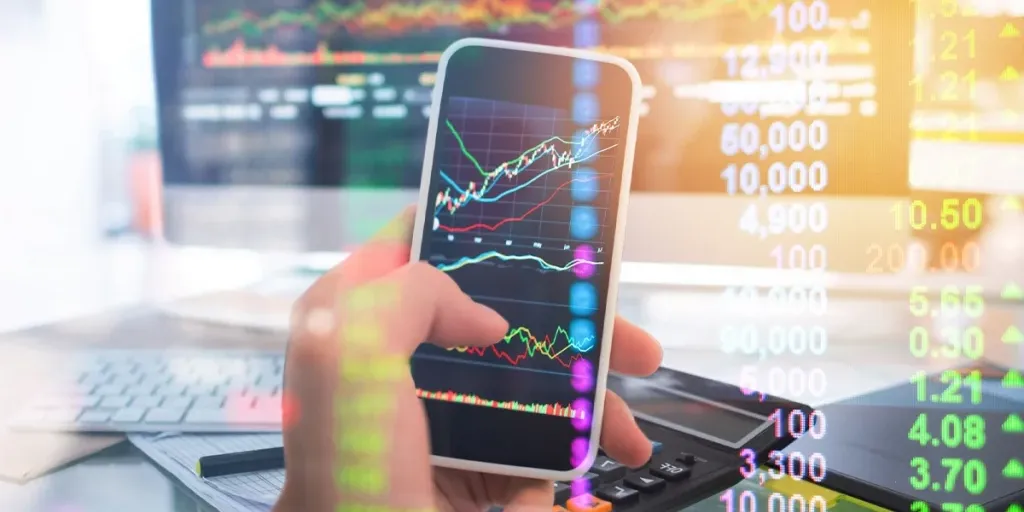 smartphone con grafici relativi agli investimenti